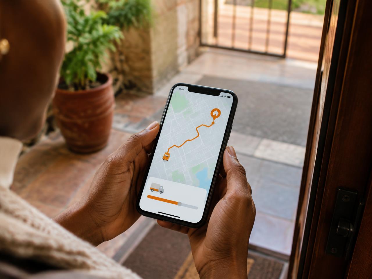 A customer following their delivery on a phone map
